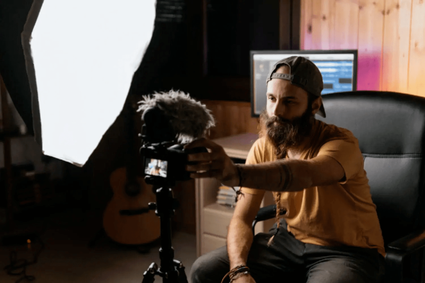 Man shooting a video with a camera