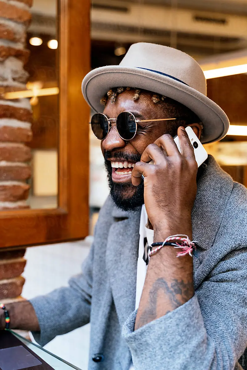 Man smiling at phone